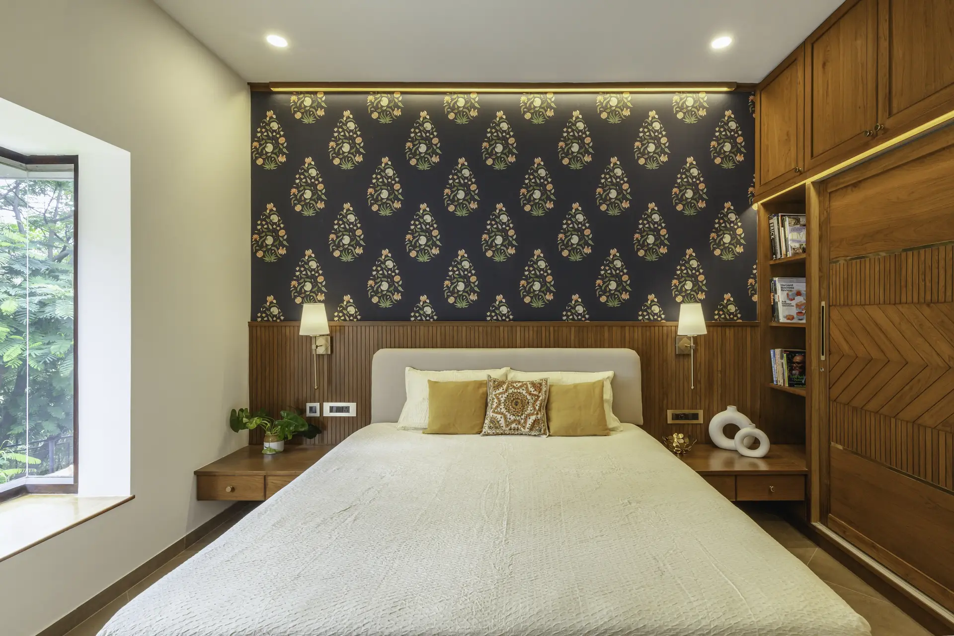Oak House Bedroom design with custom headboard and blue patterned wallpaper